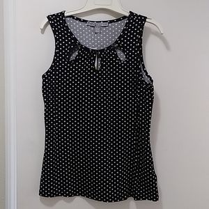 Black and white polka dot sleeveless top.  New with tags. Ladies size M